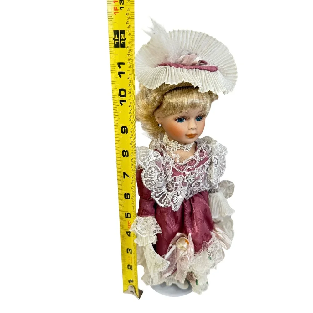 Victoriann Porcelain Doll Collector 11